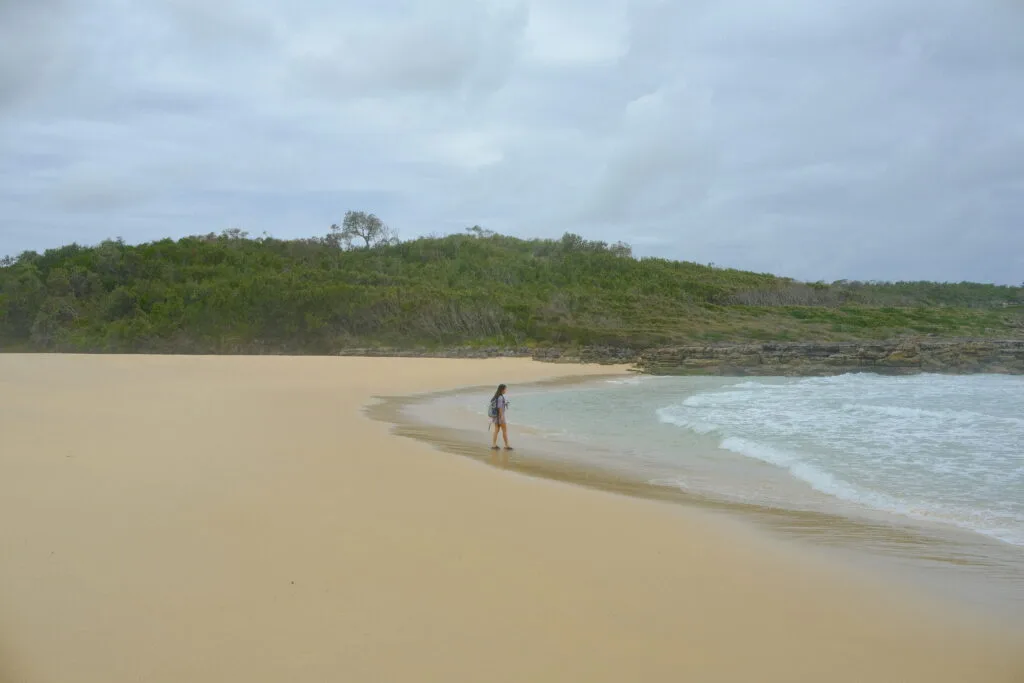 DSCF1213 A lone girl in a secluded beach.