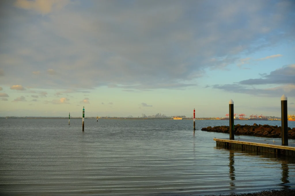 Calm waters of Botany Bay with Sydney City in the distance.