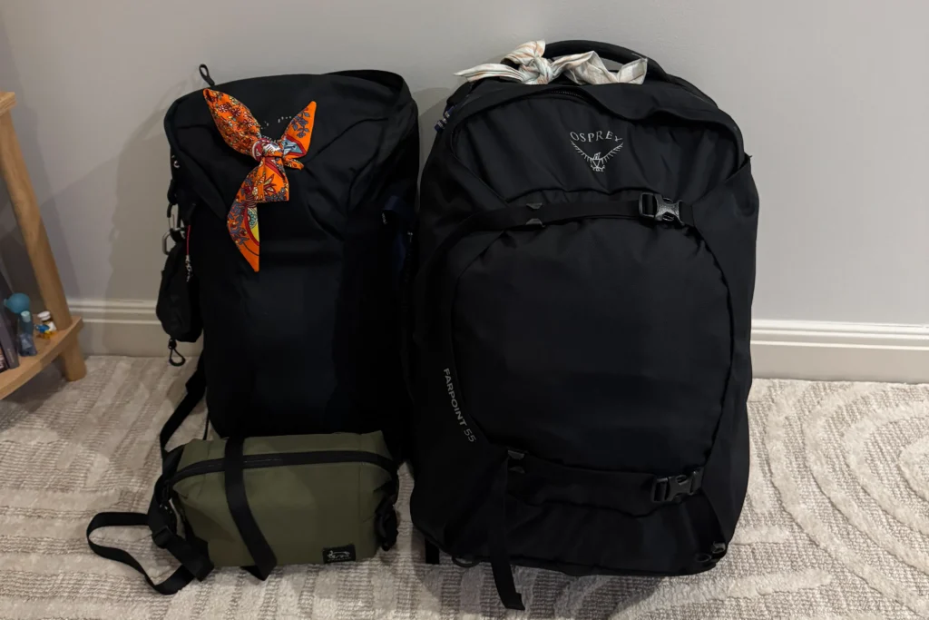 The Osprey 55L backpack and a small green camera bag
